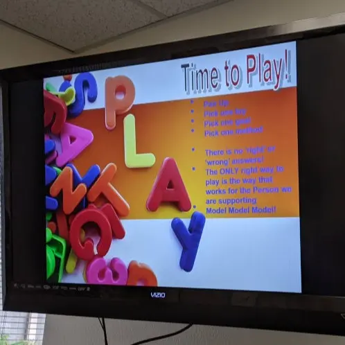 Large screen showing a play activity
